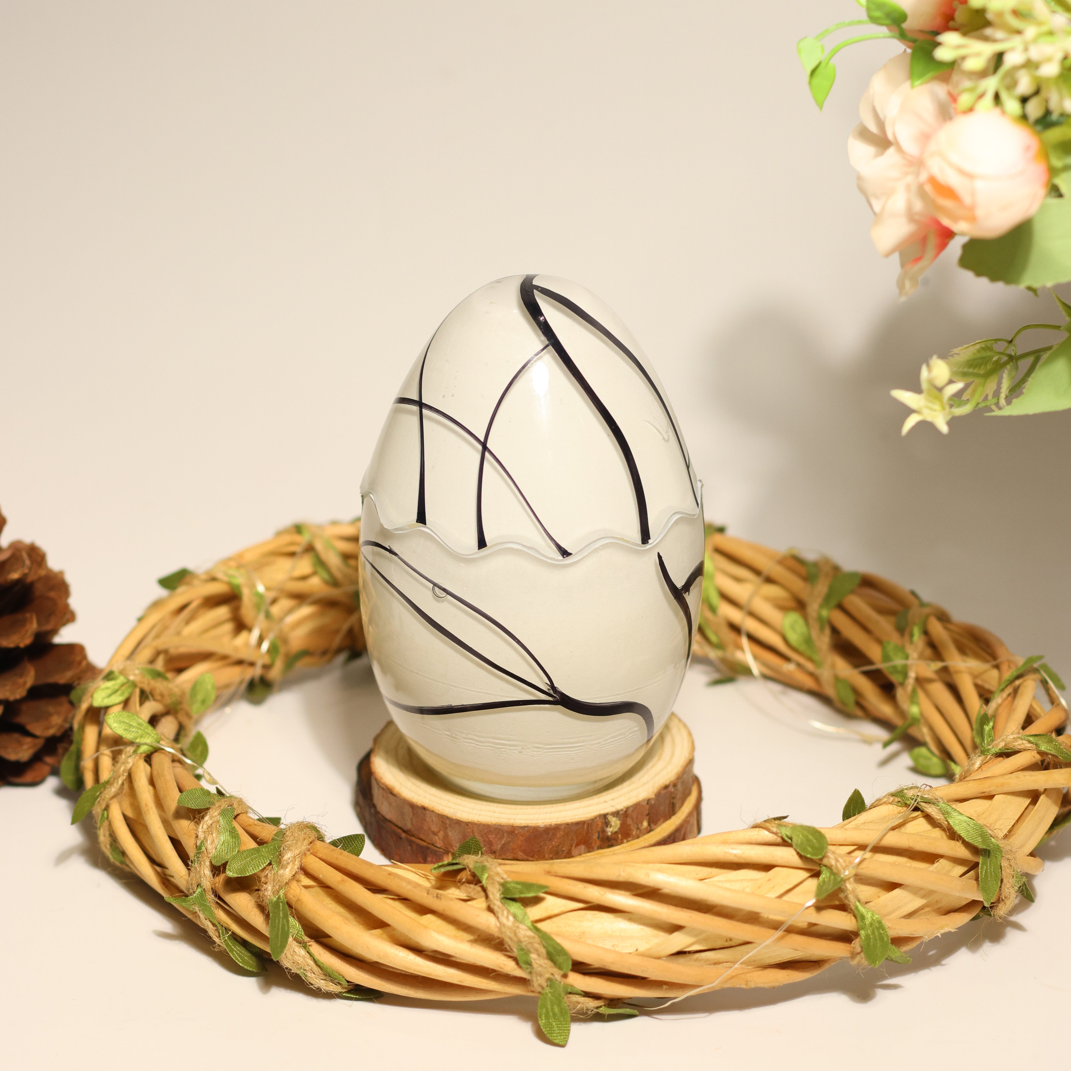 Festive Elegance Egg-Shaped Swirl Candle
