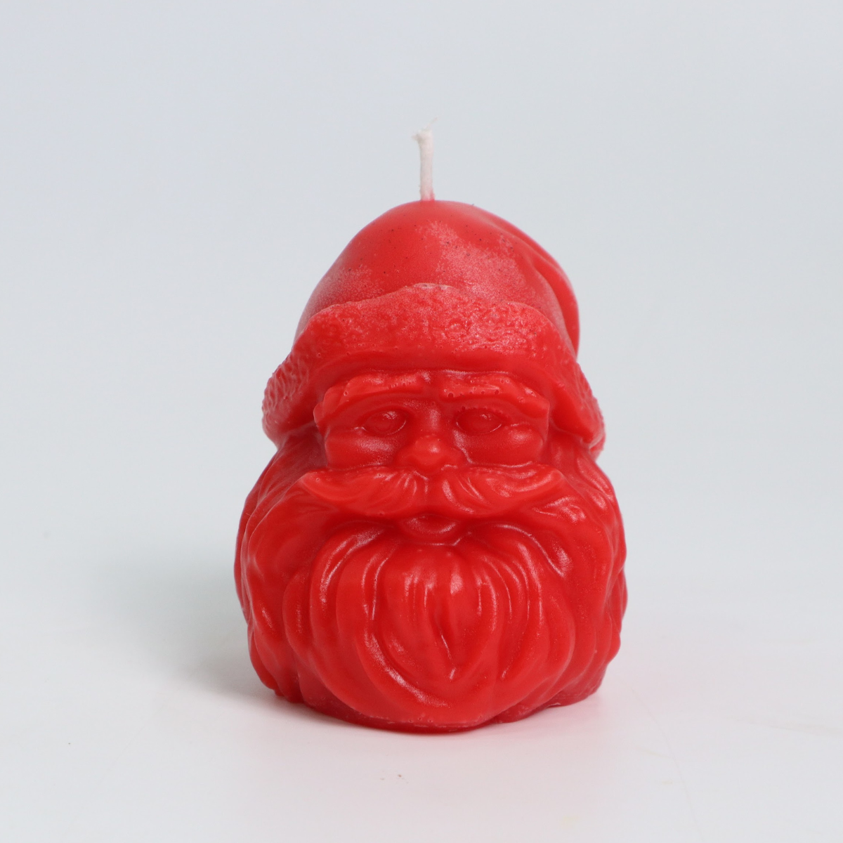 Blushing Claus Candles
