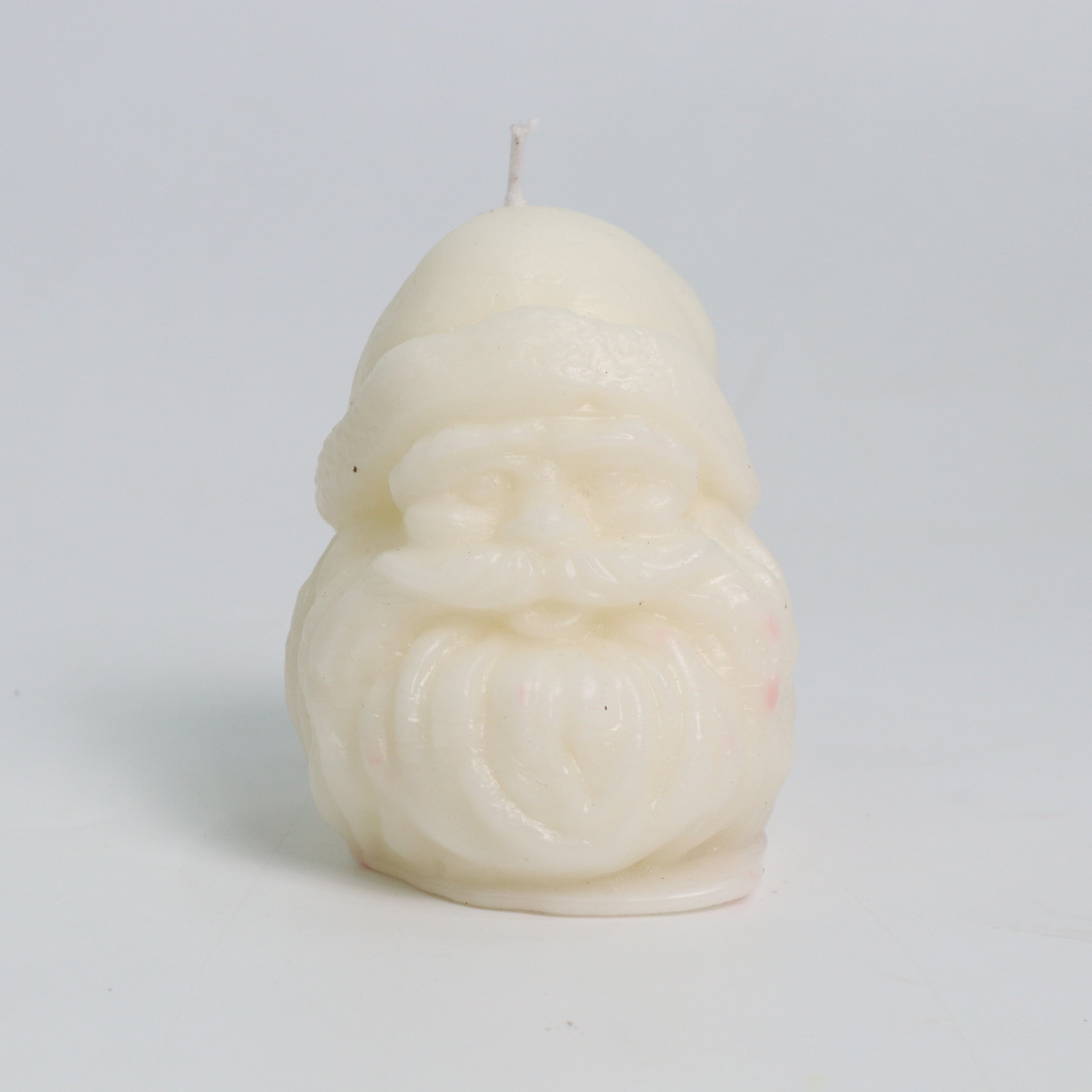 Blushing Claus Candles